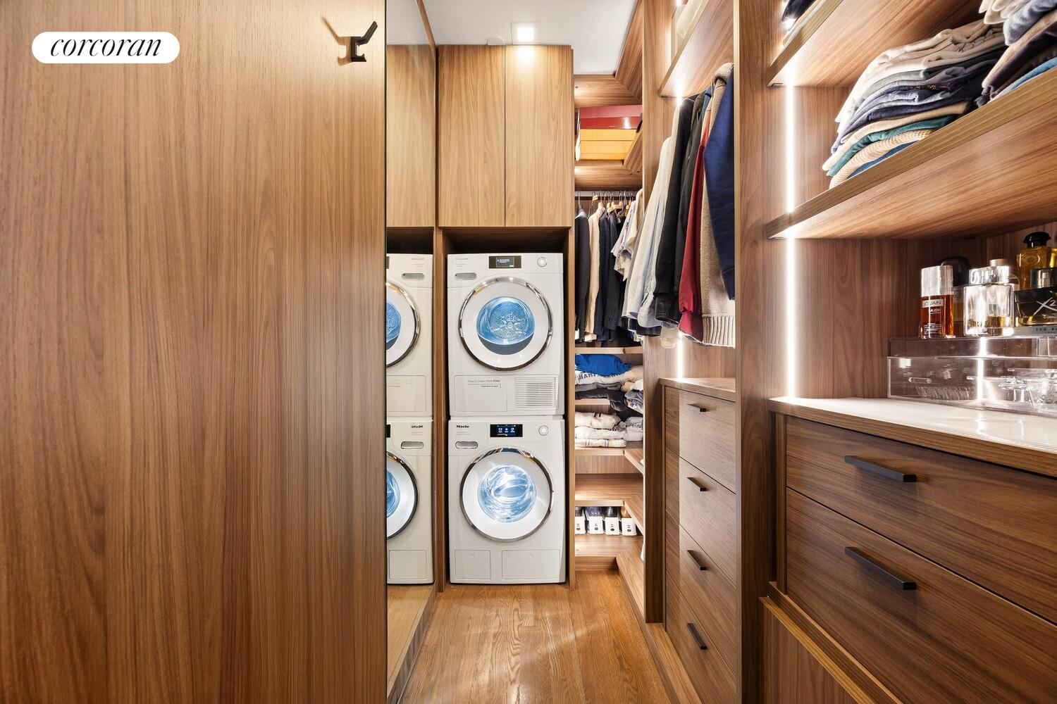 148 East 24th Street, Unit 15A Manhattan, NY 10010 - Photo 9 of 14 a utility room with dryer and washer