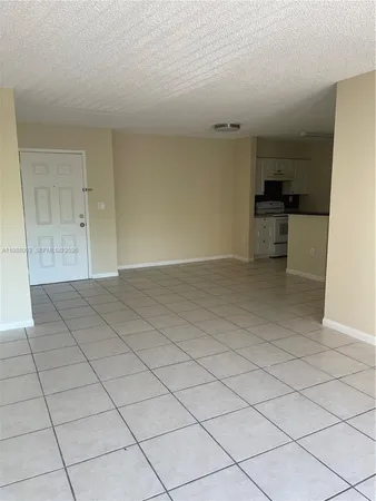 a kitchen with stainless steel appliances a sink and a cabinets