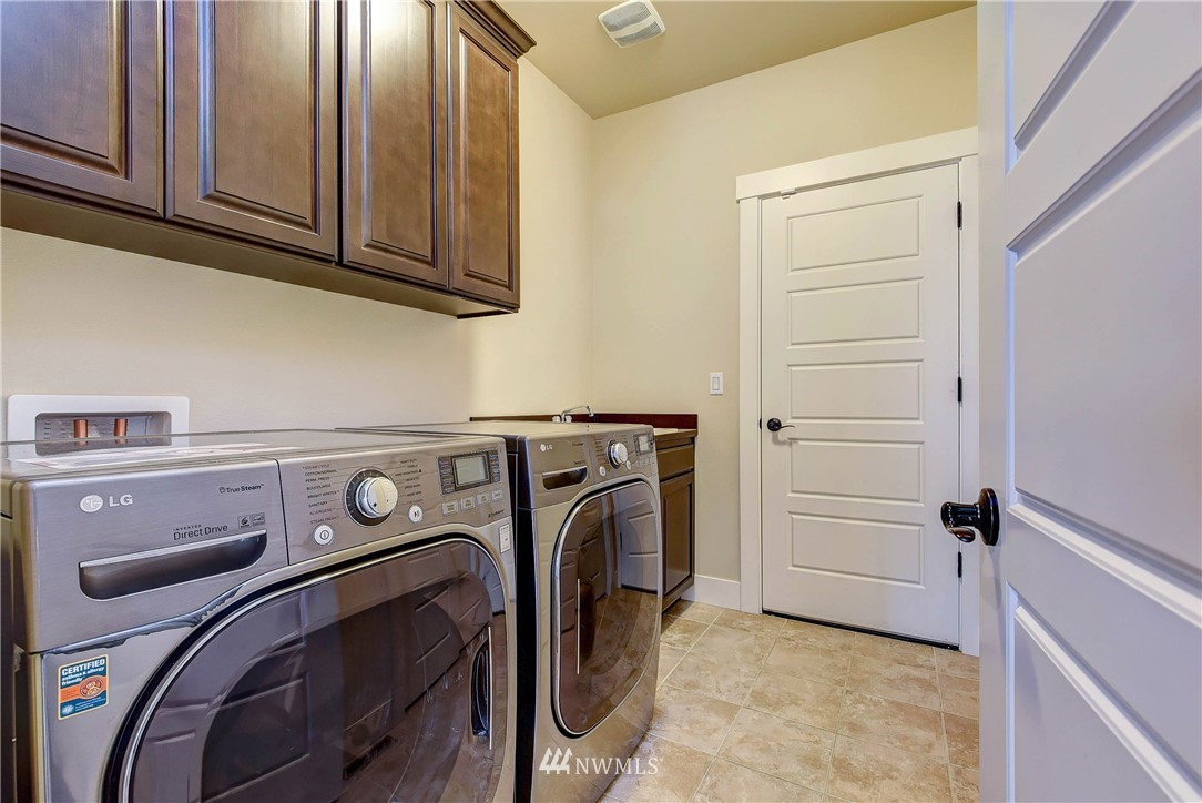 4410 220th Street Southeast Bothell, WA 98021 - Photo 15 of 28 a utility room with dryer and washer