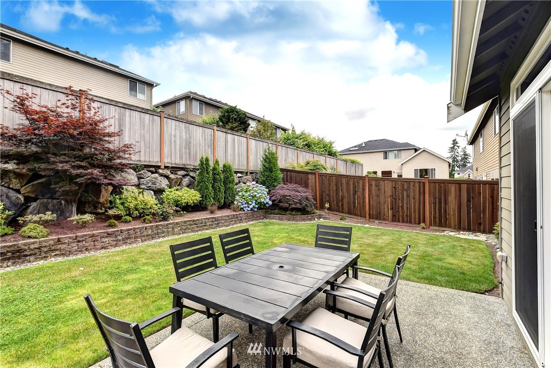 4410 220th Street Southeast Bothell, WA 98021 - Photo 26 of 28 a view of an outdoor sitting area with chairs