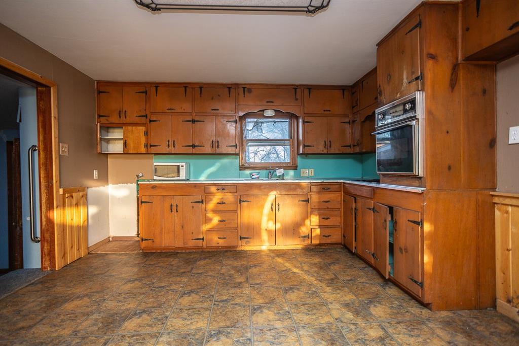 1414 Rice Avenue Gainesville, TX 76240 - Photo 15 of 21 a view of a storage & utility room