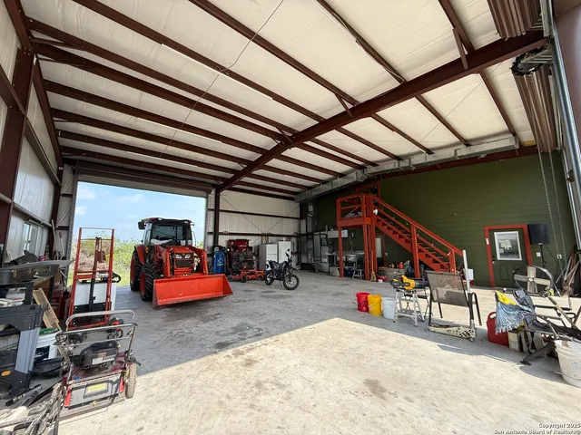 a view of garage with furniture