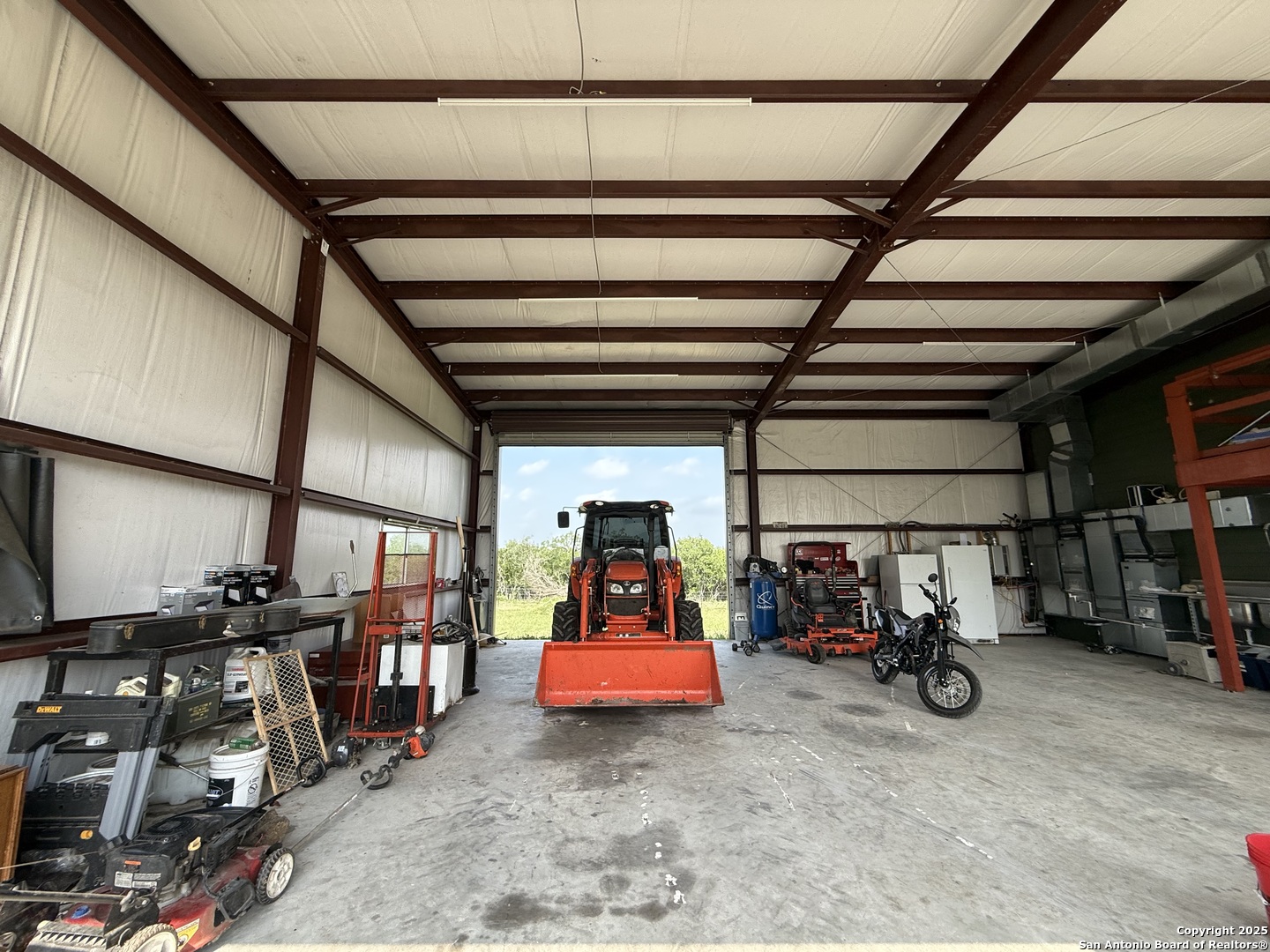 4552 Mineral Cemetery Road Beeville, TX 78102 - Photo 22 of 40 a view of garage with furniture