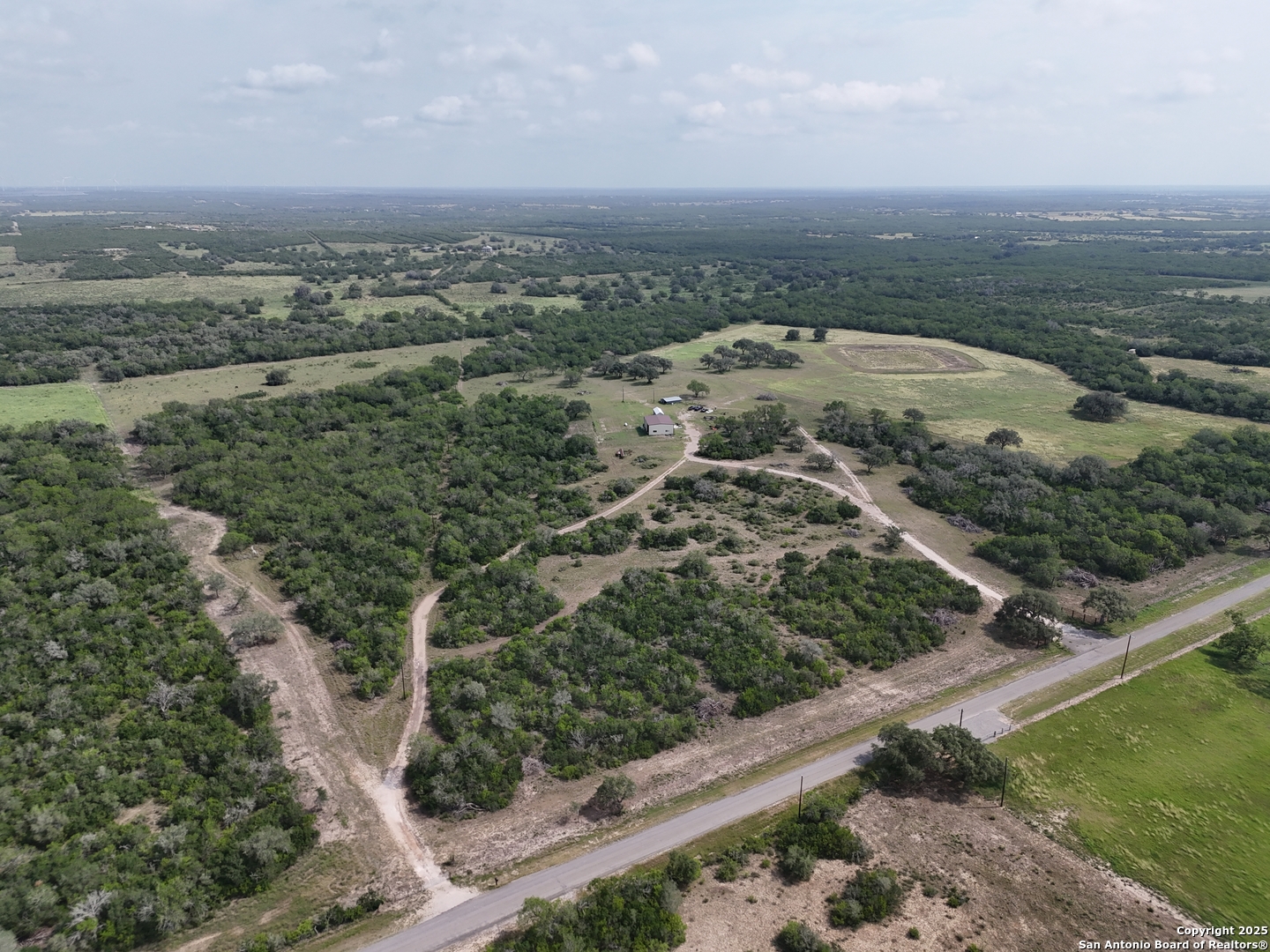 4552 Mineral Cemetery Road Beeville, TX 78102 - Photo 38 of 40 an aerial view of a house with a yard