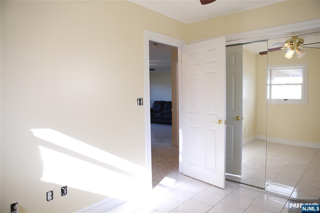 2 Harvey Avenue, Unit A Rochelle Park, NJ 07662 - Photo 16 of 25 a bathroom with a bathtub and a sink