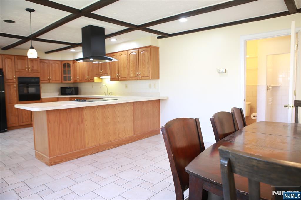 2 Harvey Avenue, Unit A Rochelle Park, NJ 07662 - Photo 5 of 25 a view of a dining room with furniture