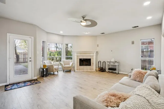 a living room with furniture or couch and a fireplace