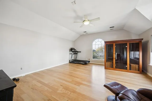 a view of a livingroom with furniture and windows