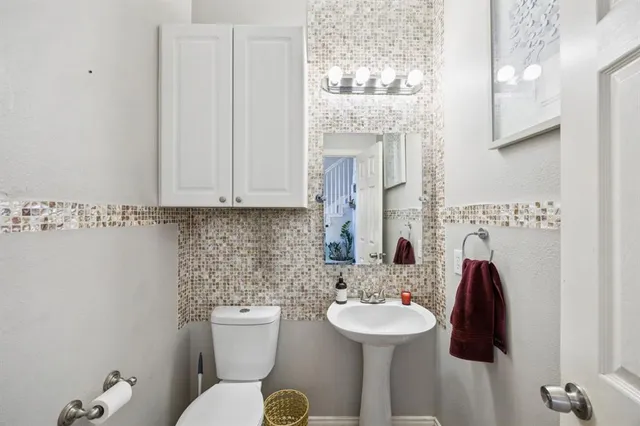 a bathroom with a sink and a toilet