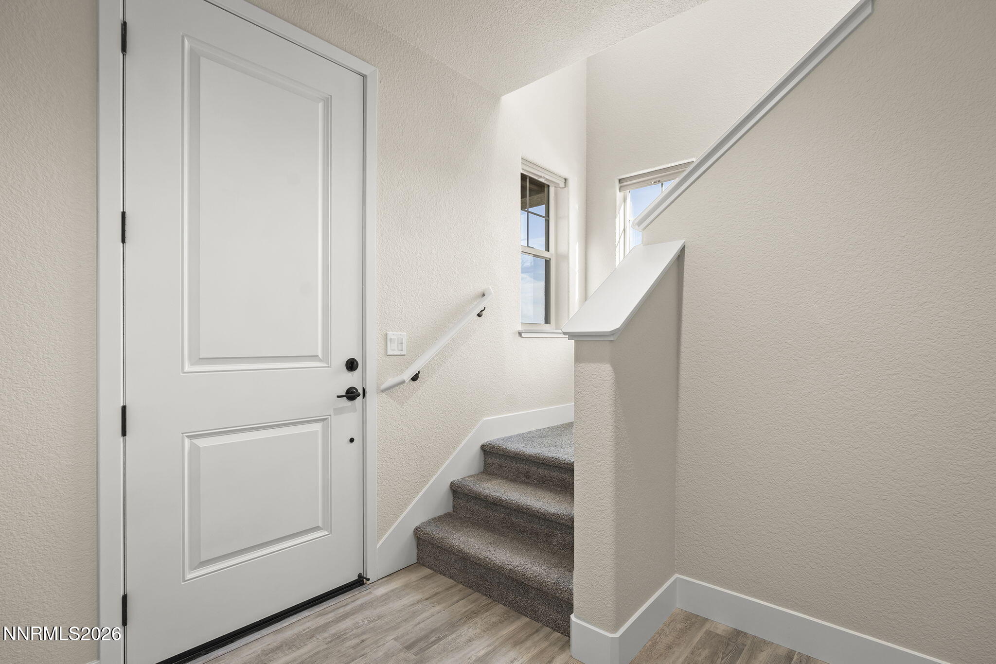 300 Cattail Circle Gardnerville, NV 89410 - Photo 15 of 39 a view of entryway with stairs and wooden floor