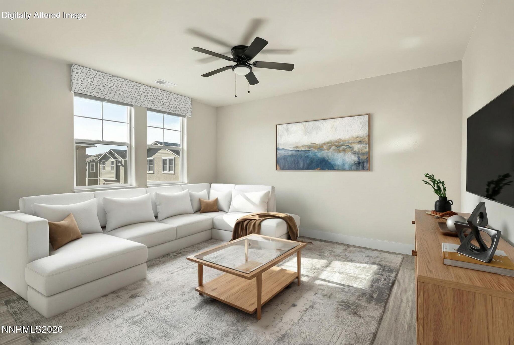 300 Cattail Circle Gardnerville, NV 89410 - Photo 3 of 39 a living room with furniture and a flat screen tv