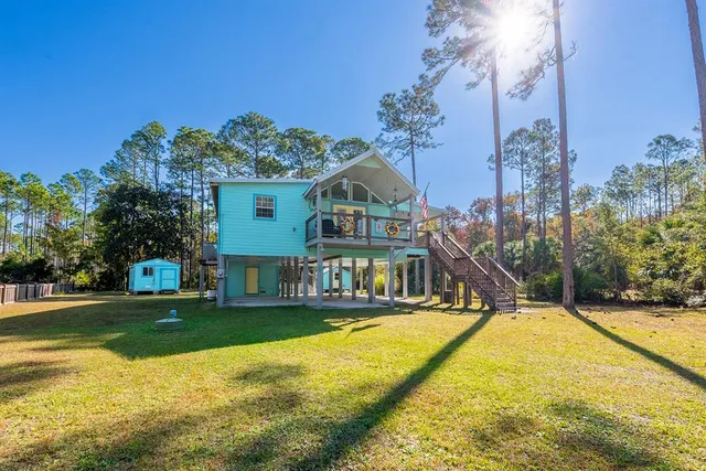 a view of a house with swimming pool