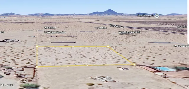 a view of a backyard of a house