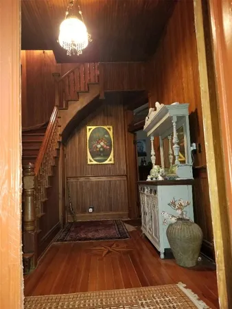 a kitchen with stainless steel appliances granite countertop a refrigerator and a stove