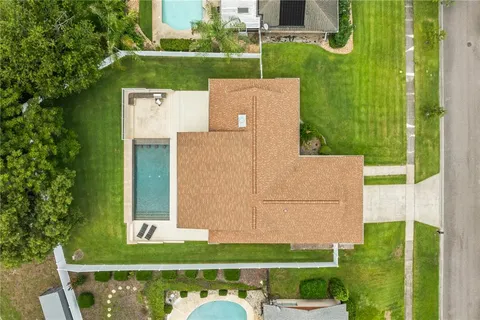 a aerial view of a house with a garden