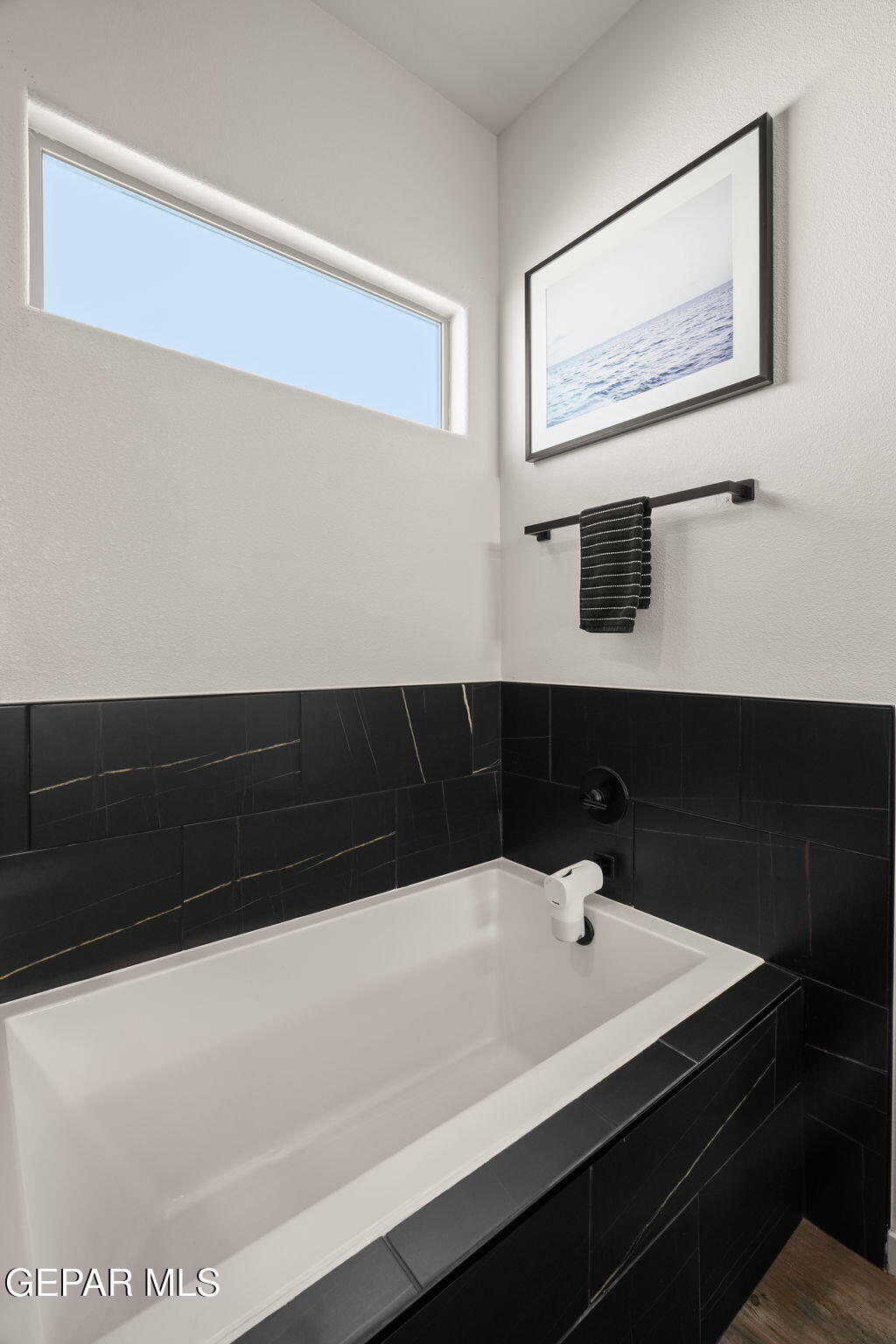 13070 Beccles Street El Paso, TX 79928 - Photo 29 of 43 a bathroom with a sink and a mirror