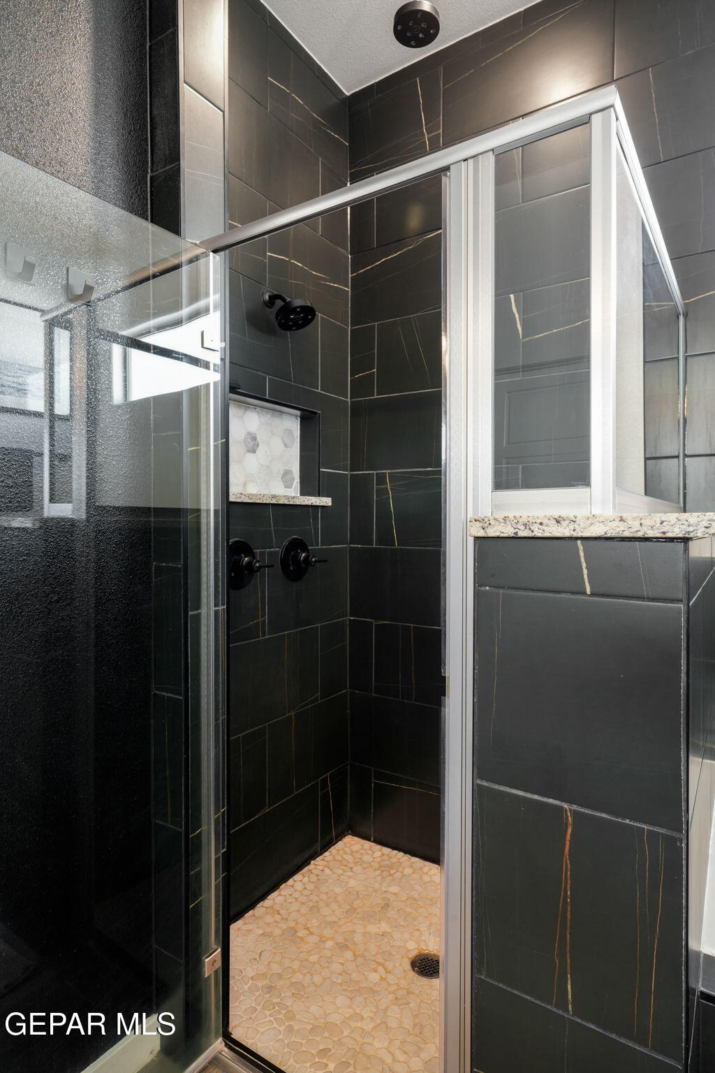 13070 Beccles Street El Paso, TX 79928 - Photo 30 of 43 a bathroom with a shower