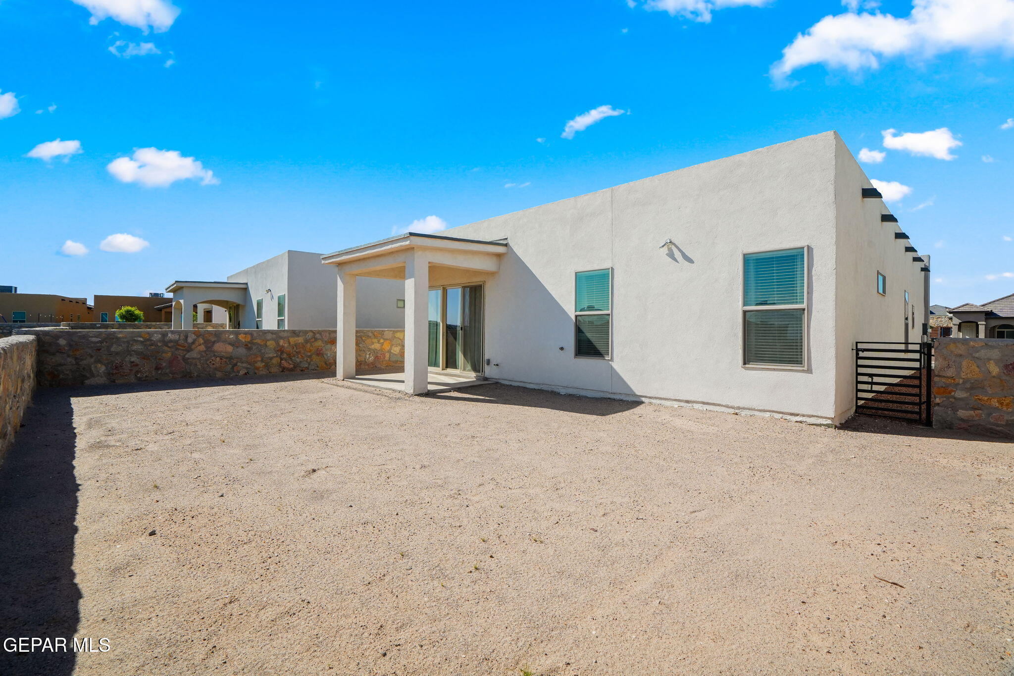 13070 Beccles Street El Paso, TX 79928 - Photo 33 of 43 a view of a house with a outdoor space