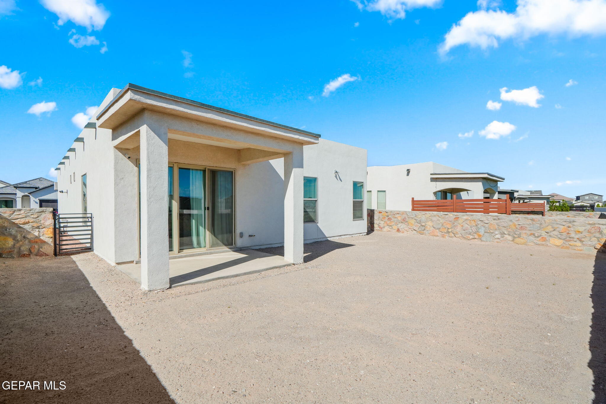 13070 Beccles Street El Paso, TX 79928 - Photo 34 of 43 a view of a house with a street