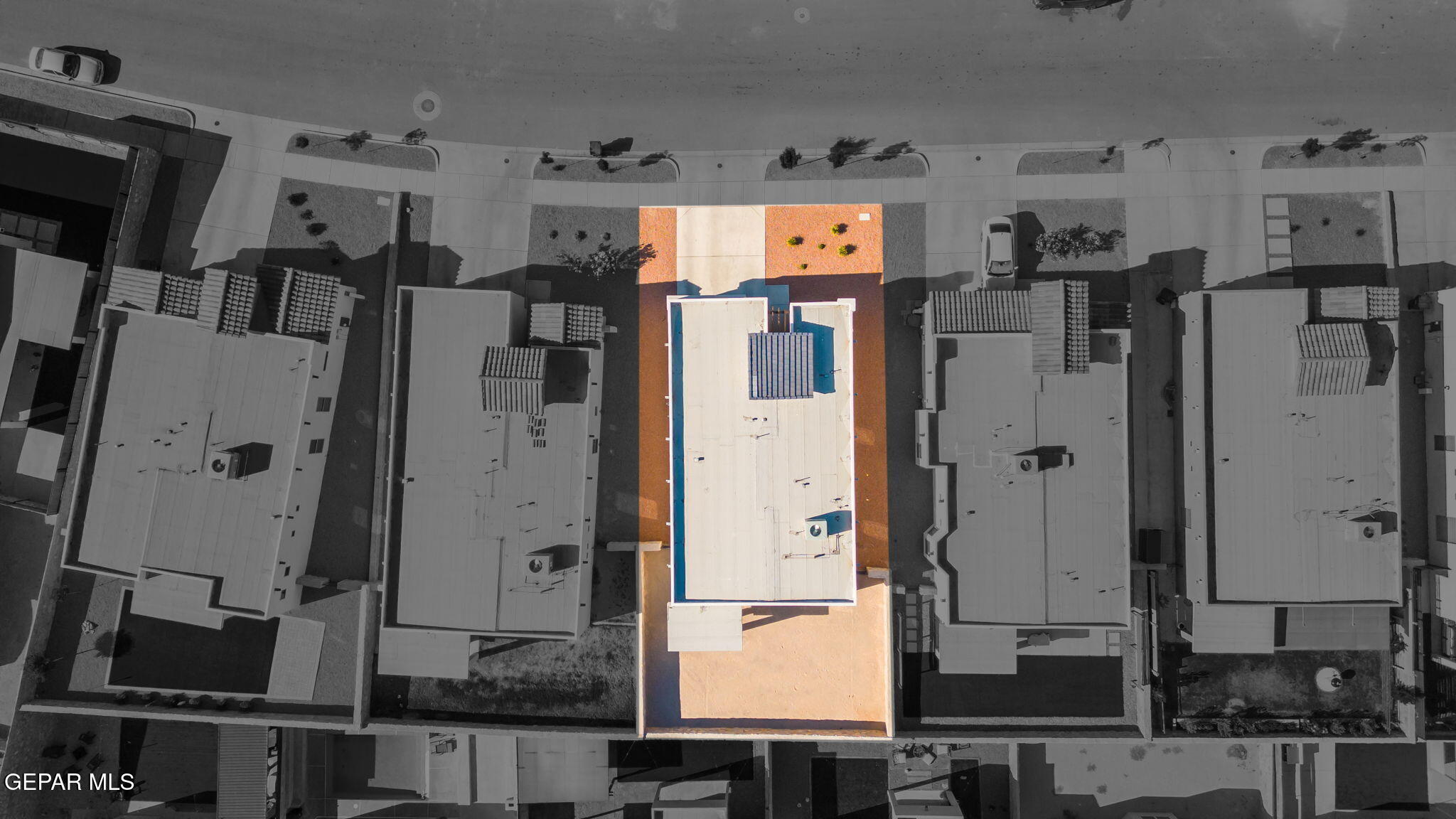 13070 Beccles Street El Paso, TX 79928 - Photo 39 of 43 an aerial view of a kitchen with refrigerator and cabinets