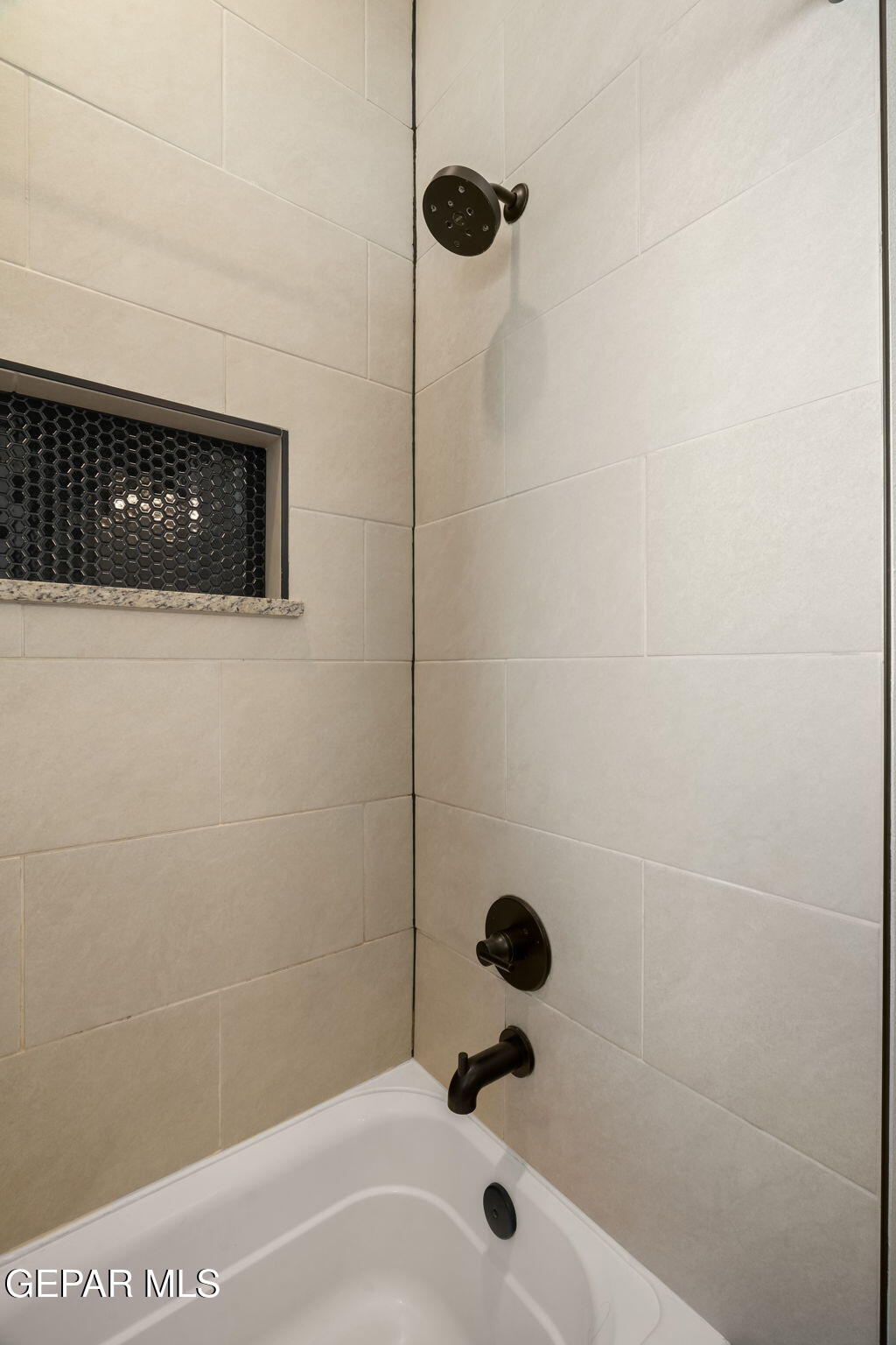 13070 Beccles Street El Paso, TX 79928 - Photo 8 of 43 a bathroom with a shower