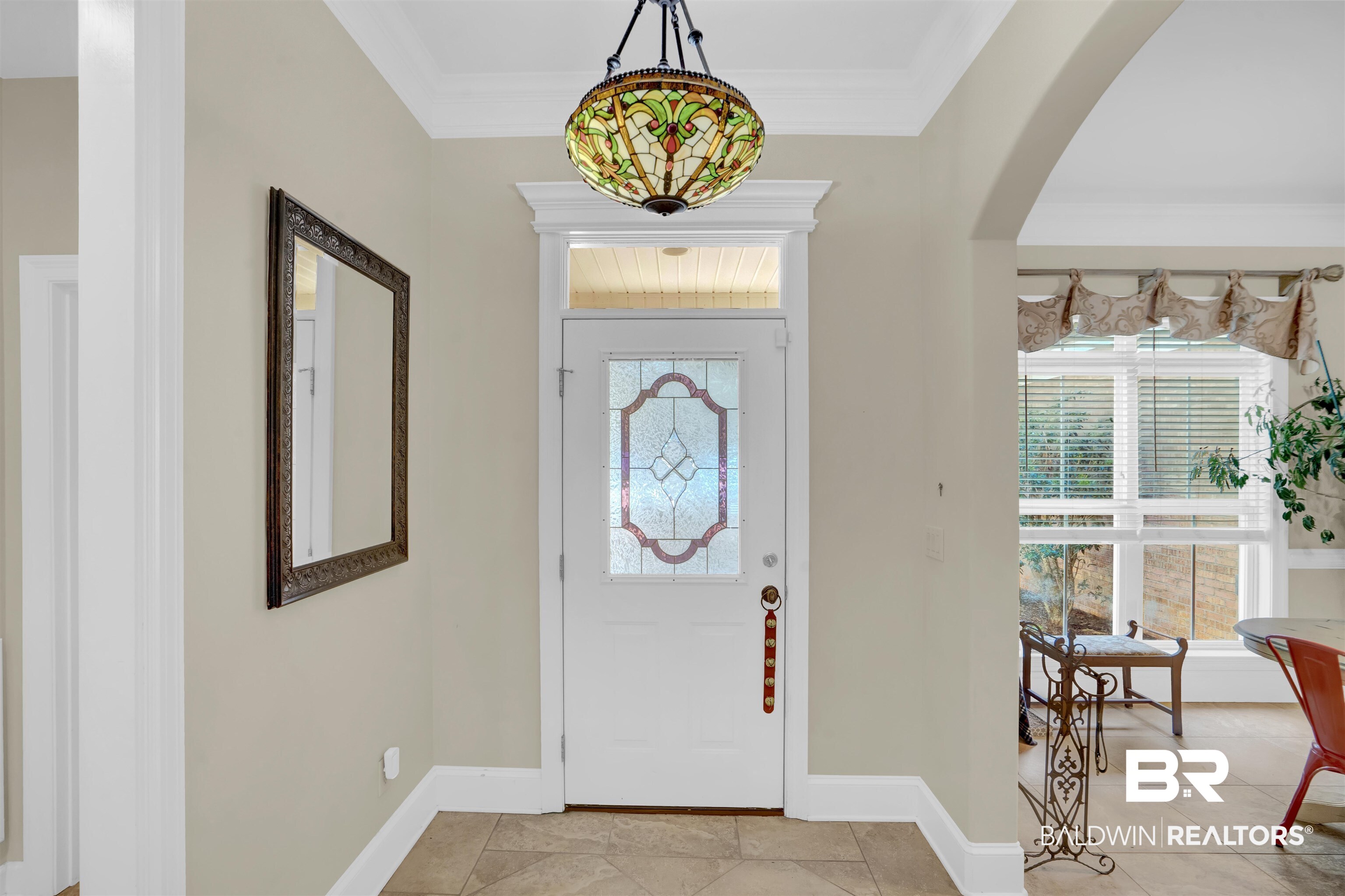 10951 Driver Court Fairhope, AL 36532 - Photo 12 of 46 Foyer entrance featuring ornamental molding and a wealth of natural light