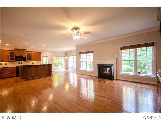 524 Hunt Field Road Manakin-Sabot, VA 23103 - Photo 8 of 22 a view of a kitchen with furniture and a fireplace
