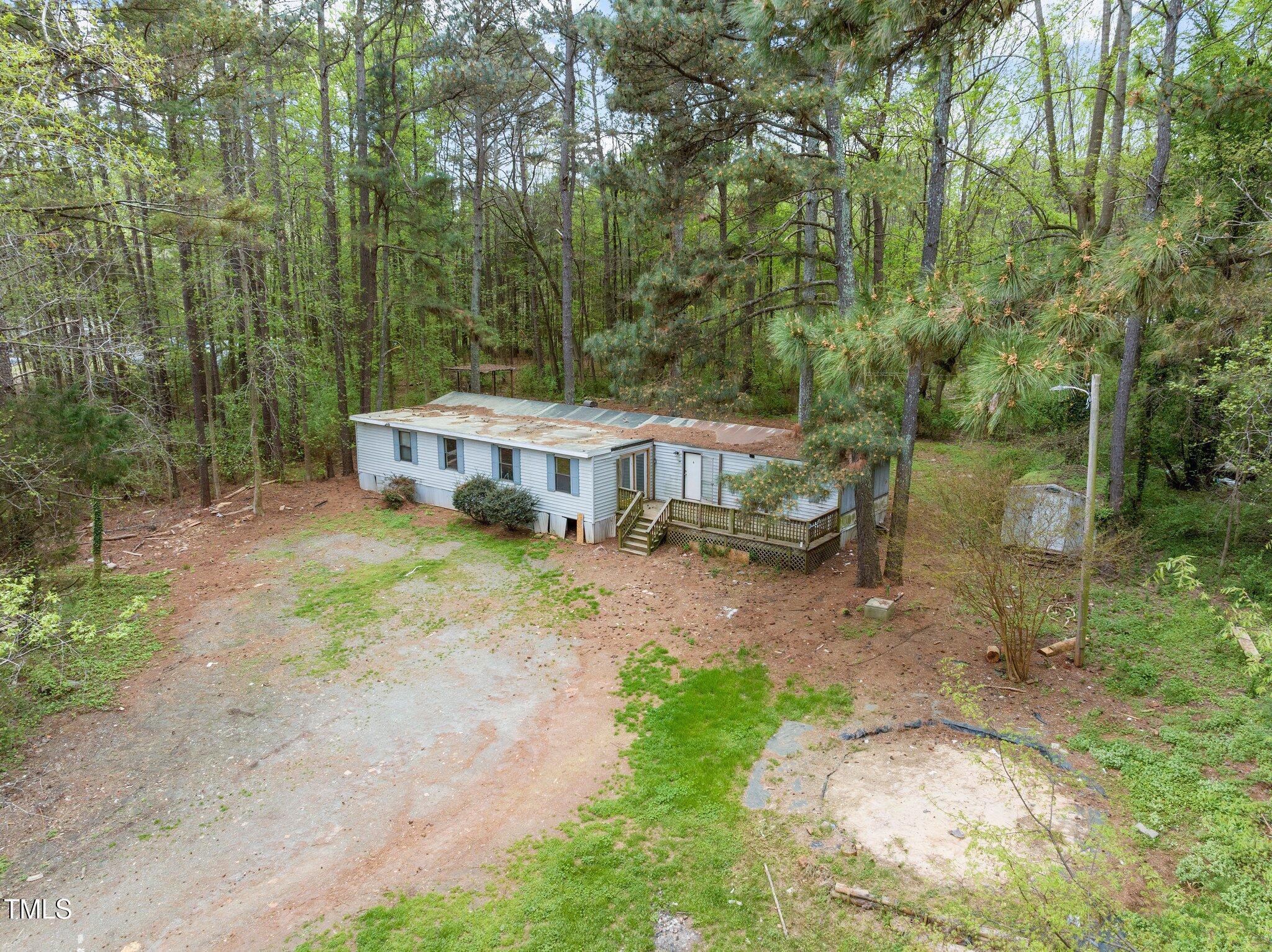960 Gees Grove Road Siler City, NC 27344 - Photo 3 of 53 3-web-or-mls-DJI_20250404100621_0937_D