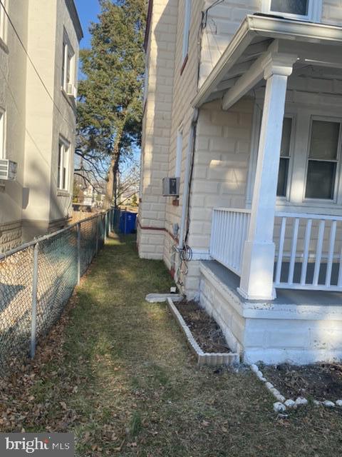 640 Manor Road Beverly, NJ 08010 - Photo 2 of 22 a view of a porch with a bench
