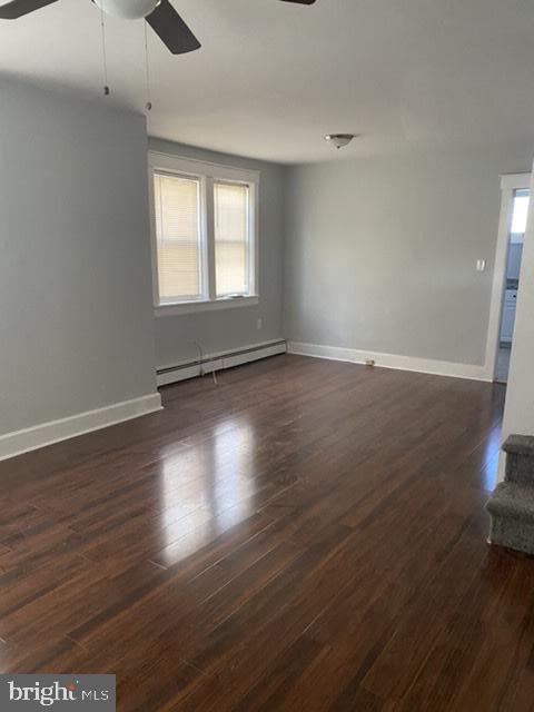 640 Manor Road Beverly, NJ 08010 - Photo 4 of 22 an empty room with wooden floor and windows