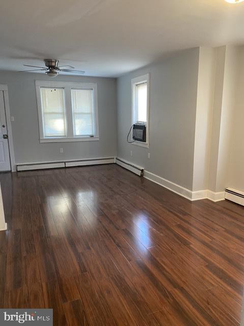 640 Manor Road Beverly, NJ 08010 - Photo 5 of 22 an empty room with wooden floor and windows