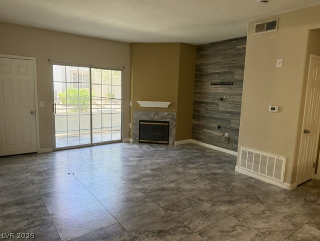 3318 North Decatur Boulevard, Unit 1163 Las Vegas, NV 89130 - Photo 5 of 35 A sleek fireplace anchors this versatile living area, featuring large sliding glass doors opening to a private patio.