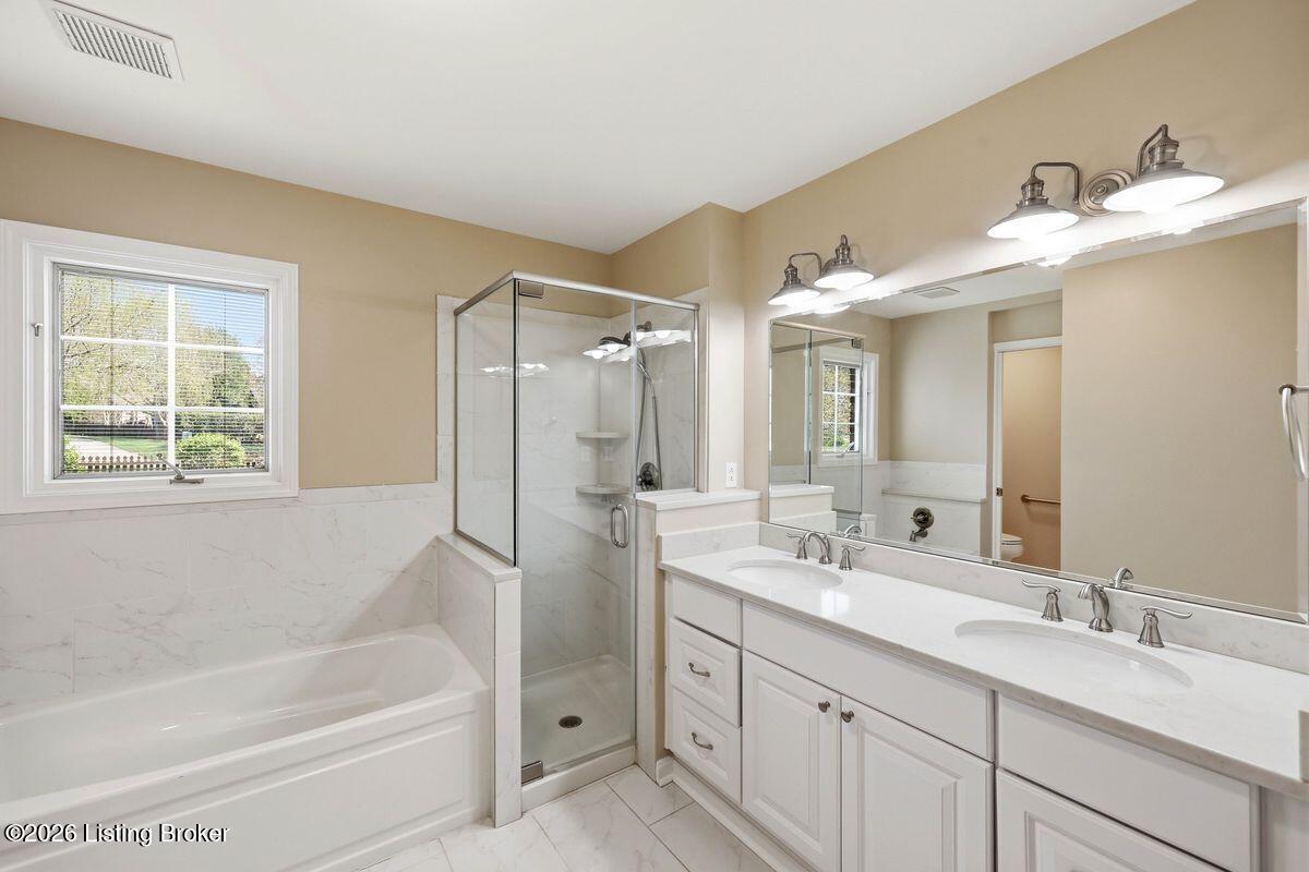 7719 Hermits Run Road Louisville, KY 40291 - Photo 27 of 54 Dual sink vanity, ceramic tile flooring, freshly painted
