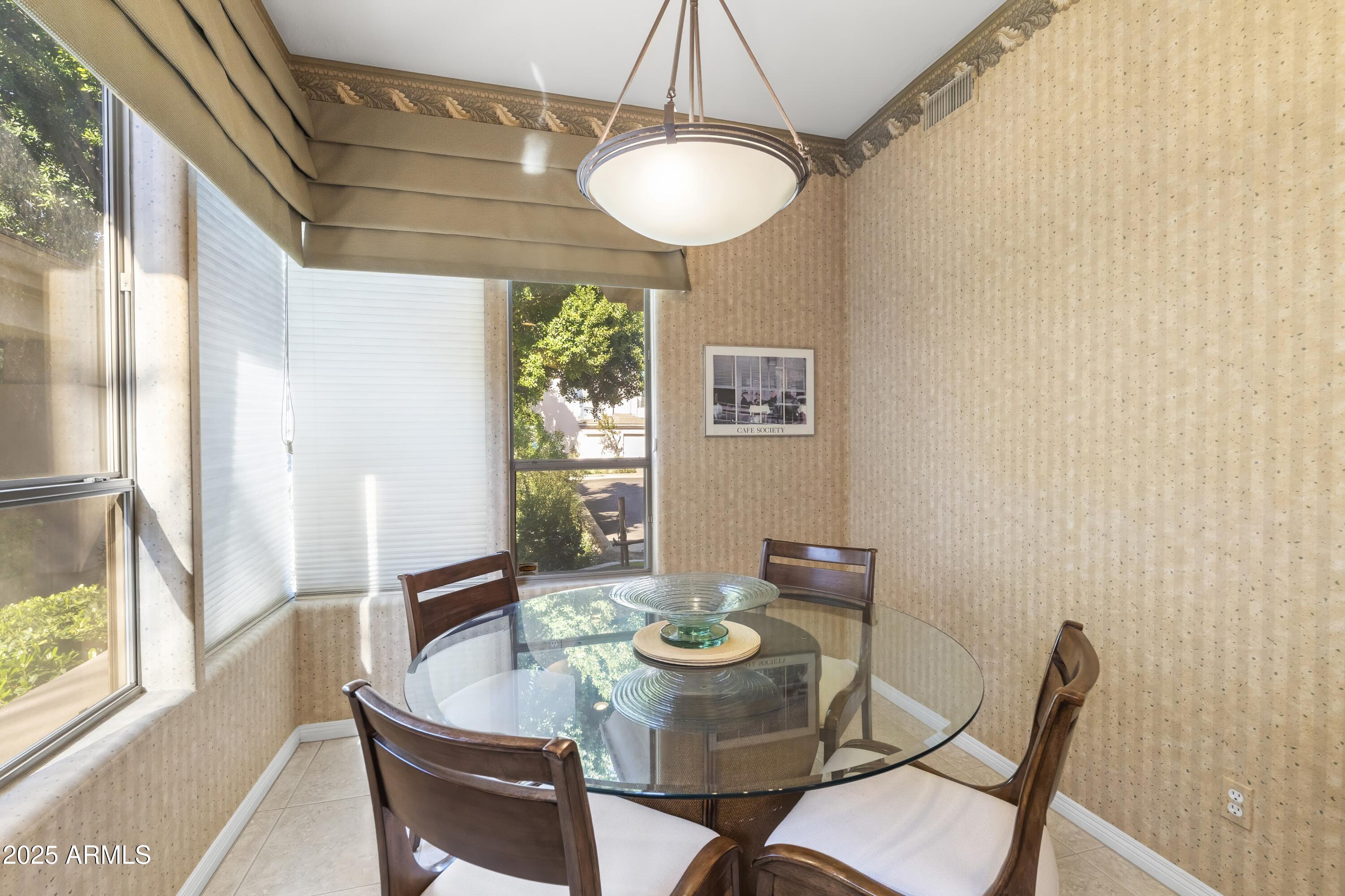 7267 East Vaquero Drive Scottsdale, AZ 85253 - Photo 15 of 37 a dining room with furniture and window