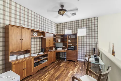 a kitchen with a sink and a stove top oven