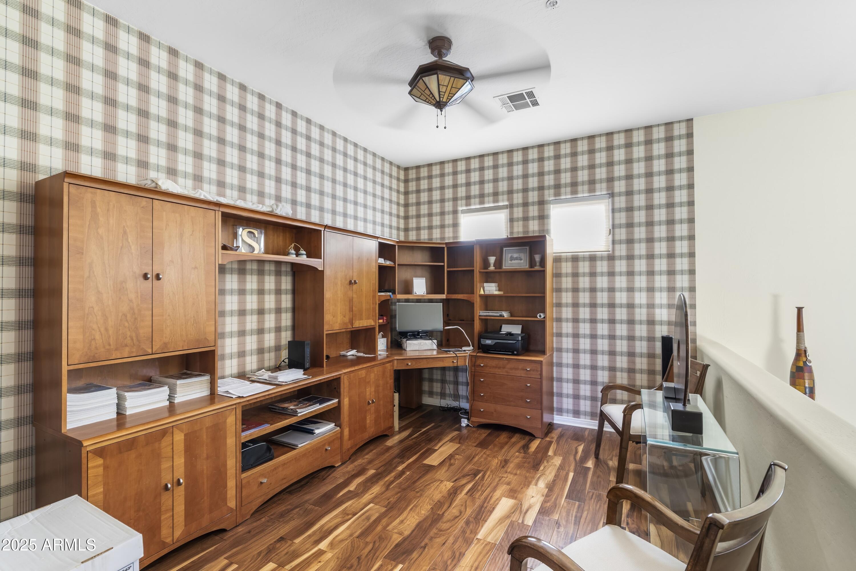7267 East Vaquero Drive Scottsdale, AZ 85253 - Photo 27 of 37 a kitchen with a sink and a stove top oven