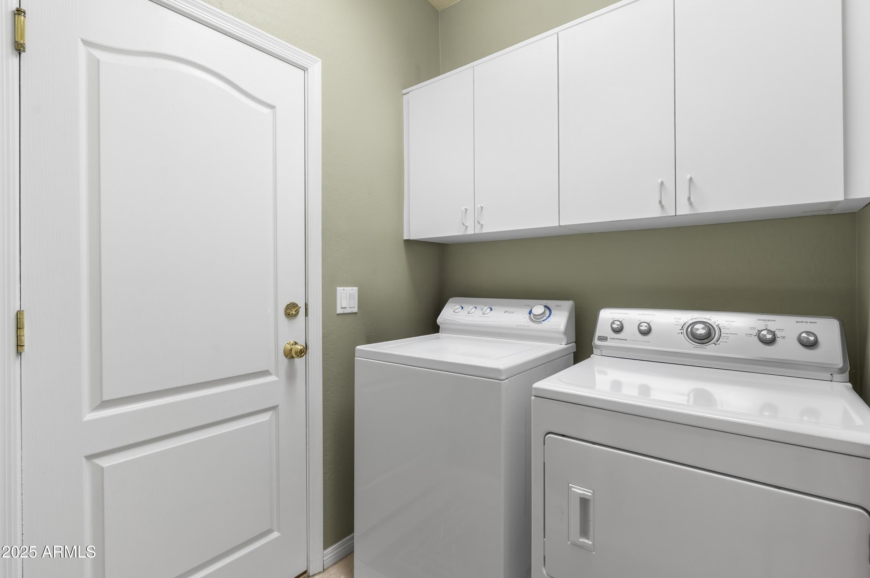 7267 East Vaquero Drive Scottsdale, AZ 85253 - Photo 33 of 37 a utility room with dryer and washer