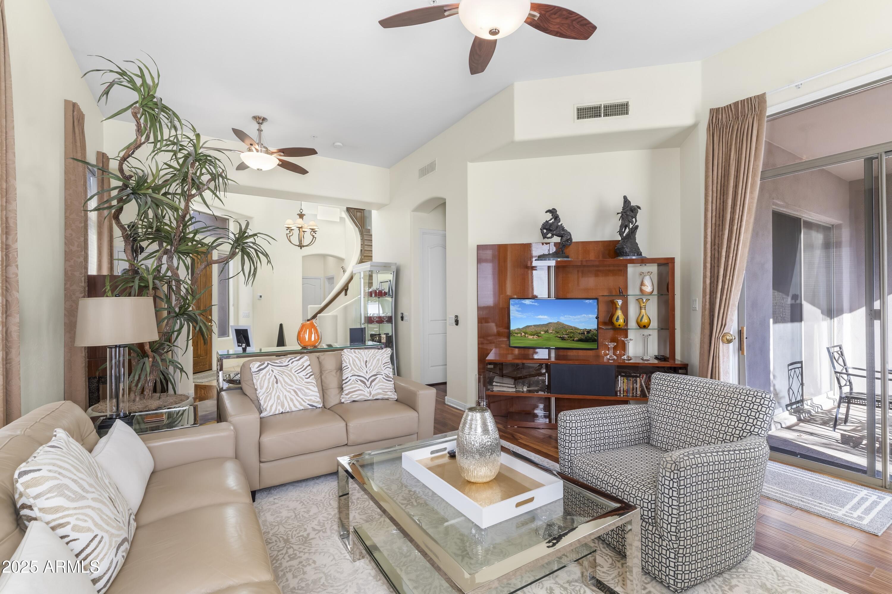 7267 East Vaquero Drive Scottsdale, AZ 85253 - Photo 10 of 37 a living room with furniture and wooden floor
