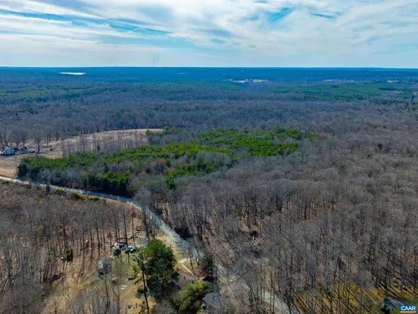 a view of a yard with an ocean