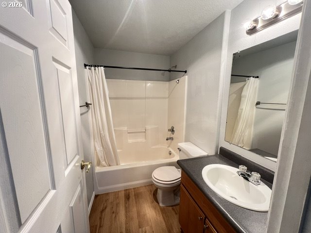 659 Northeast 162nd Avenue, Unit 302 Portland, OR 97230 - Photo 11 of 17 a bathroom with a sink toilet and shower