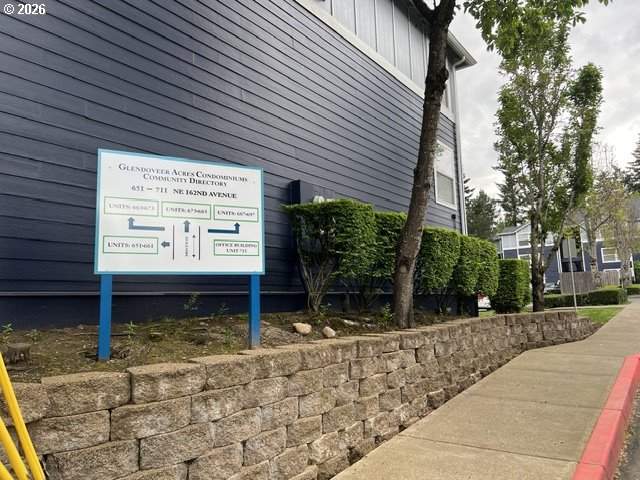 659 Northeast 162nd Avenue, Unit 302 Portland, OR 97230 - Photo 3 of 17 a sign on the side of a building