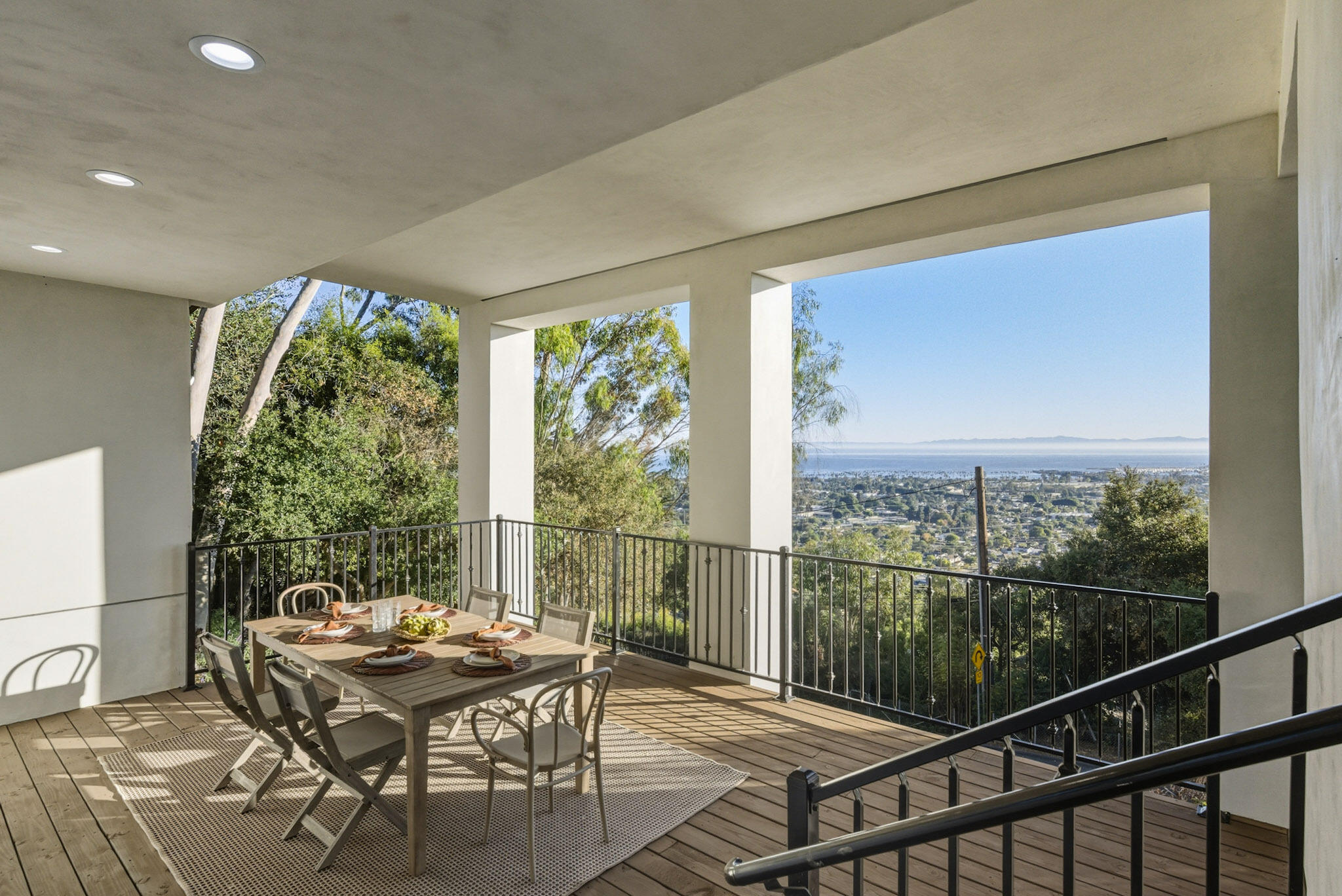 210 Las Alturas Road Santa Barbara, CA 93103 - Photo 39 of 61 a view of a balcony and wooden floor