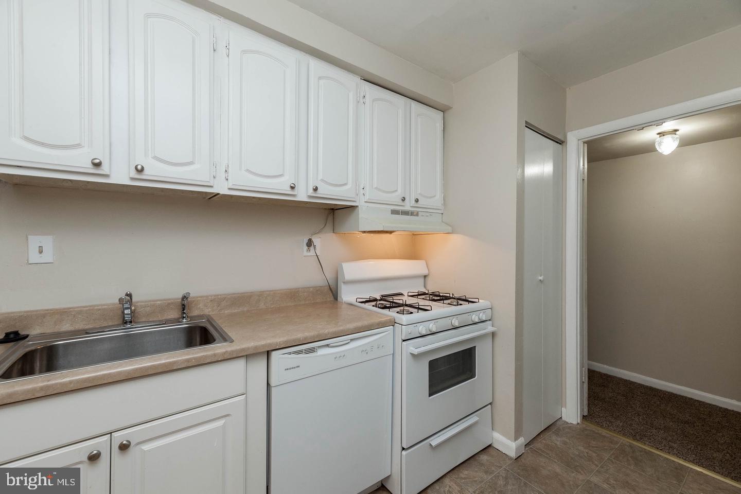 3827 St Barnabas Road, Unit T Suitland, MD 20746 - Photo 3 of 15 Charming kitchen with modern finishes.