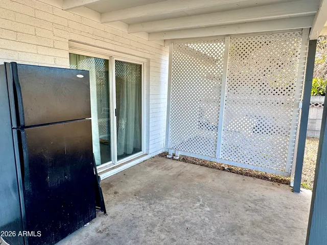 a view of a backyard of the house