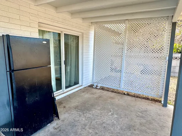 a view of a backyard of the house