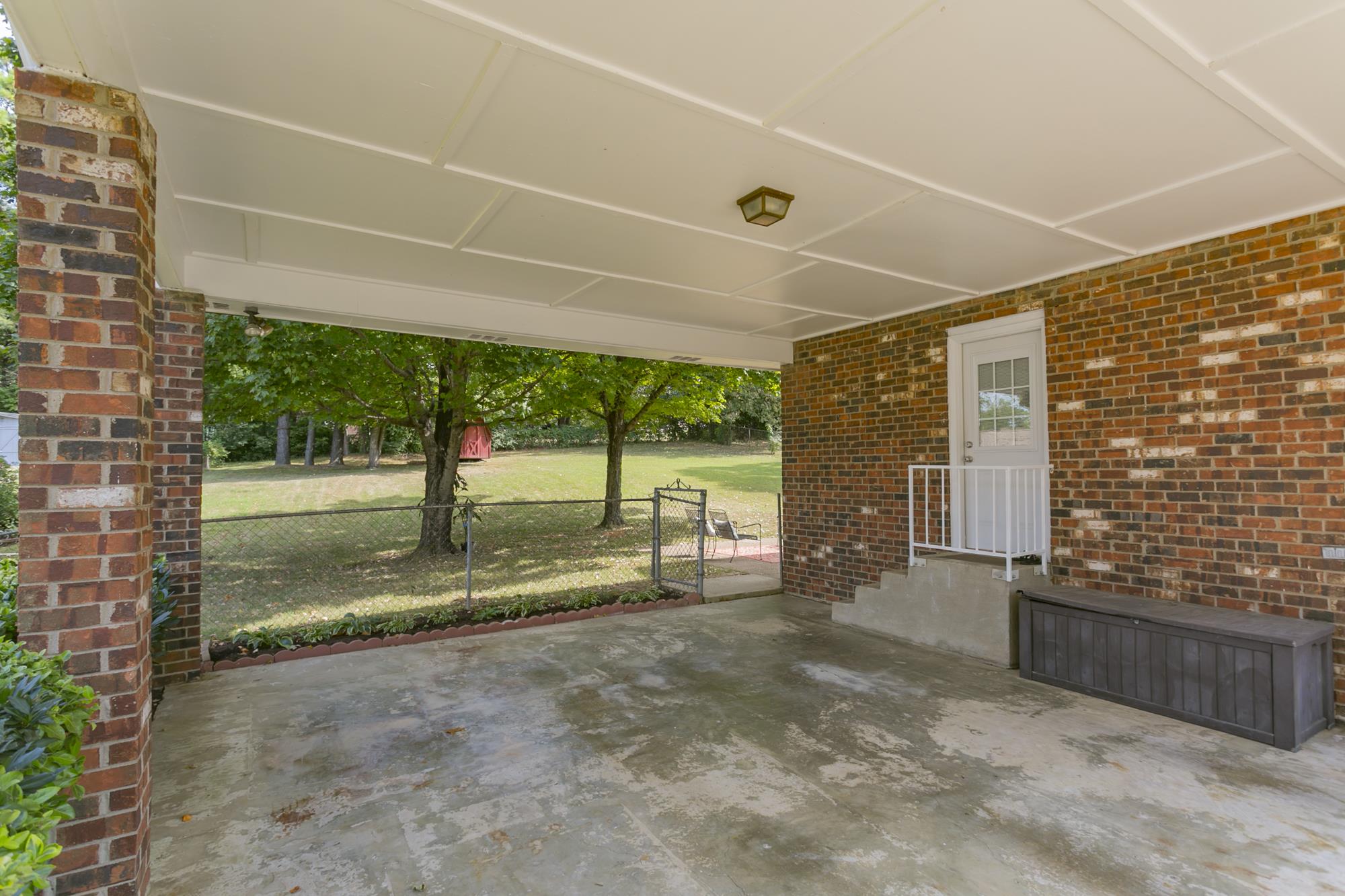 605 Baton Rouge Court Hermitage, TN 37076 - Photo 23 of 24 a view of a porch with wooden floor and fence