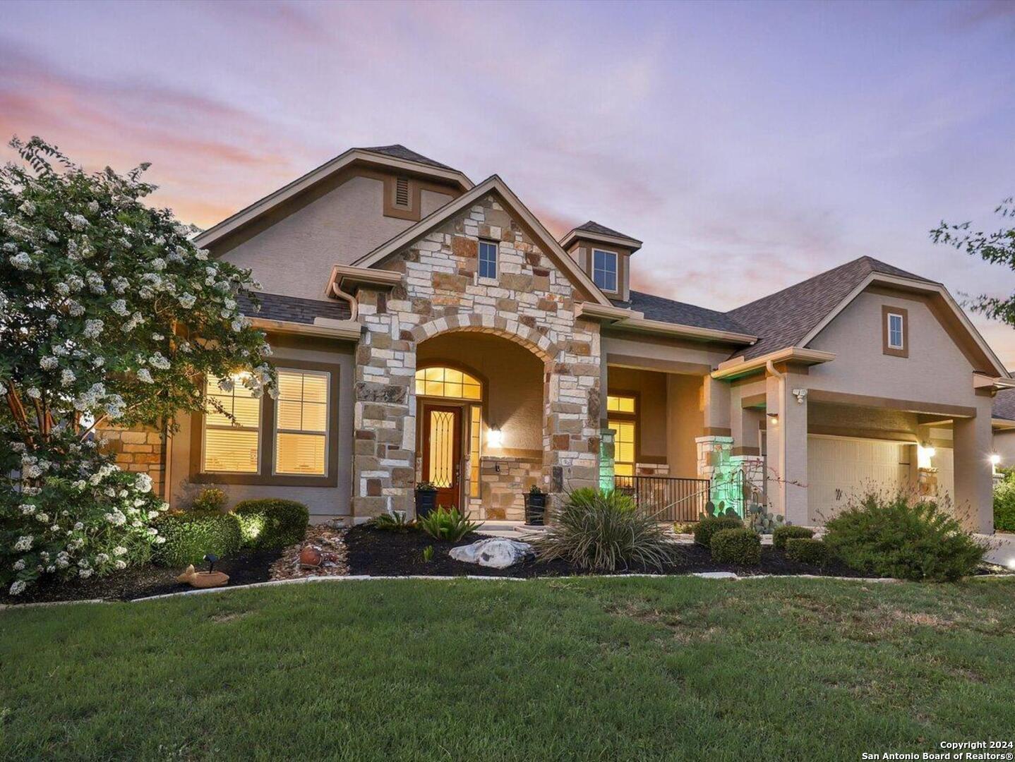 24310 Mateo Ridge San Antonio, TX 78261 - Photo 1 of 1 a front view of a house with a yard