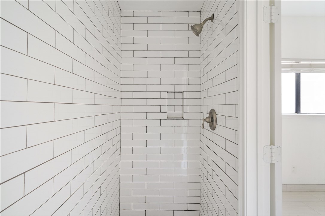 2605 Enfield Road, Unit 110 Austin, TX 78703 - Photo 13 of 22 Integrally Tiled Shower Space