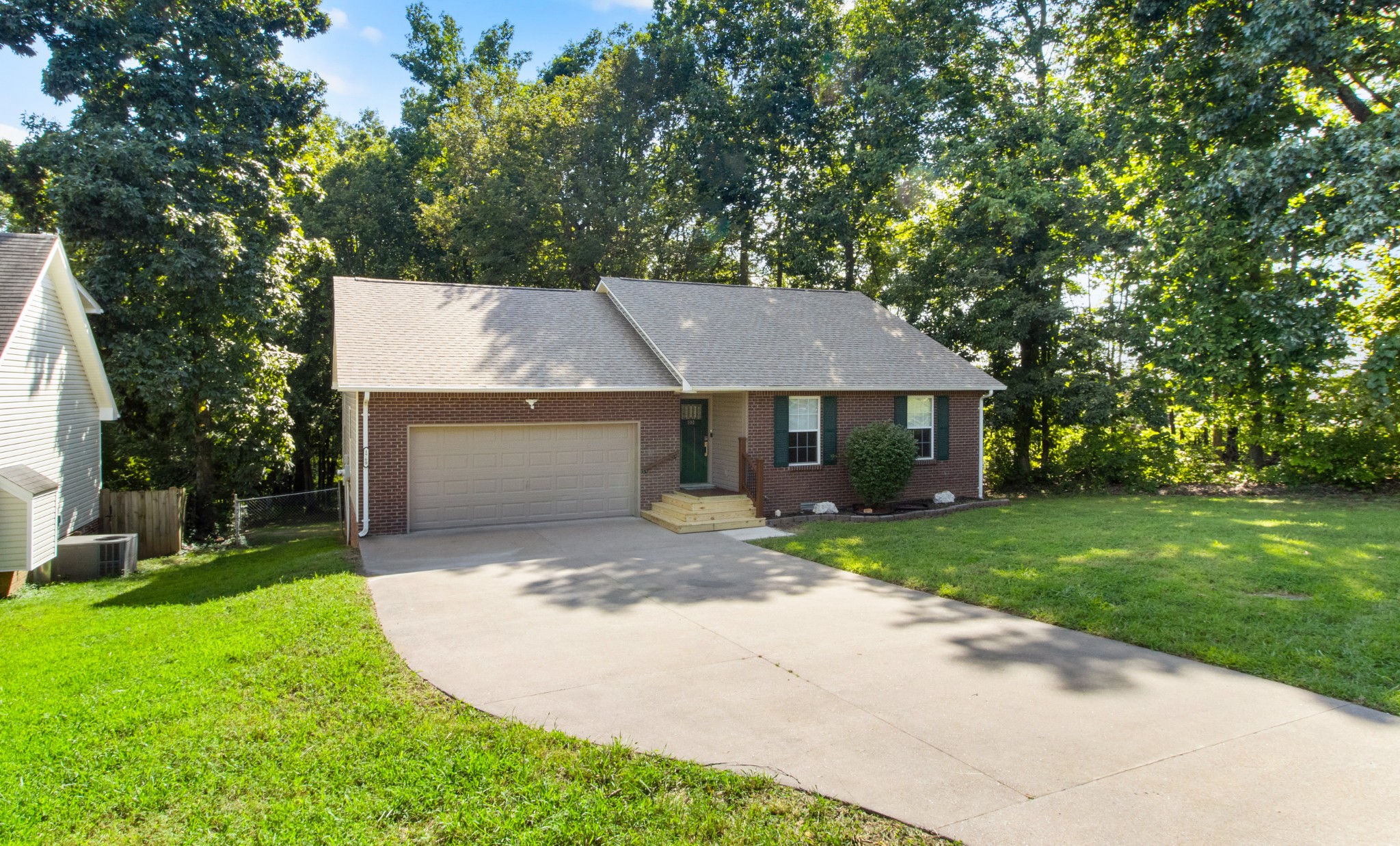 1760 Hazelwood Road Clarksville, TN 37040 - Photo 2 of 34 front view of a house with a yard