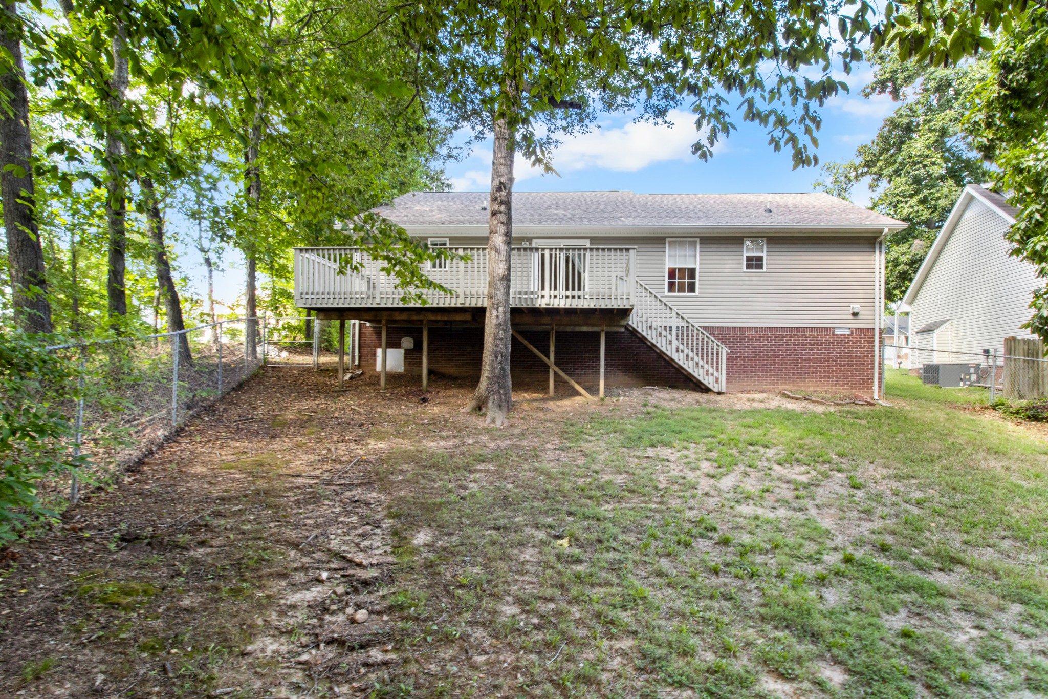 1760 Hazelwood Road Clarksville, TN 37040 - Photo 32 of 34 a front view of a house with a yard and garage